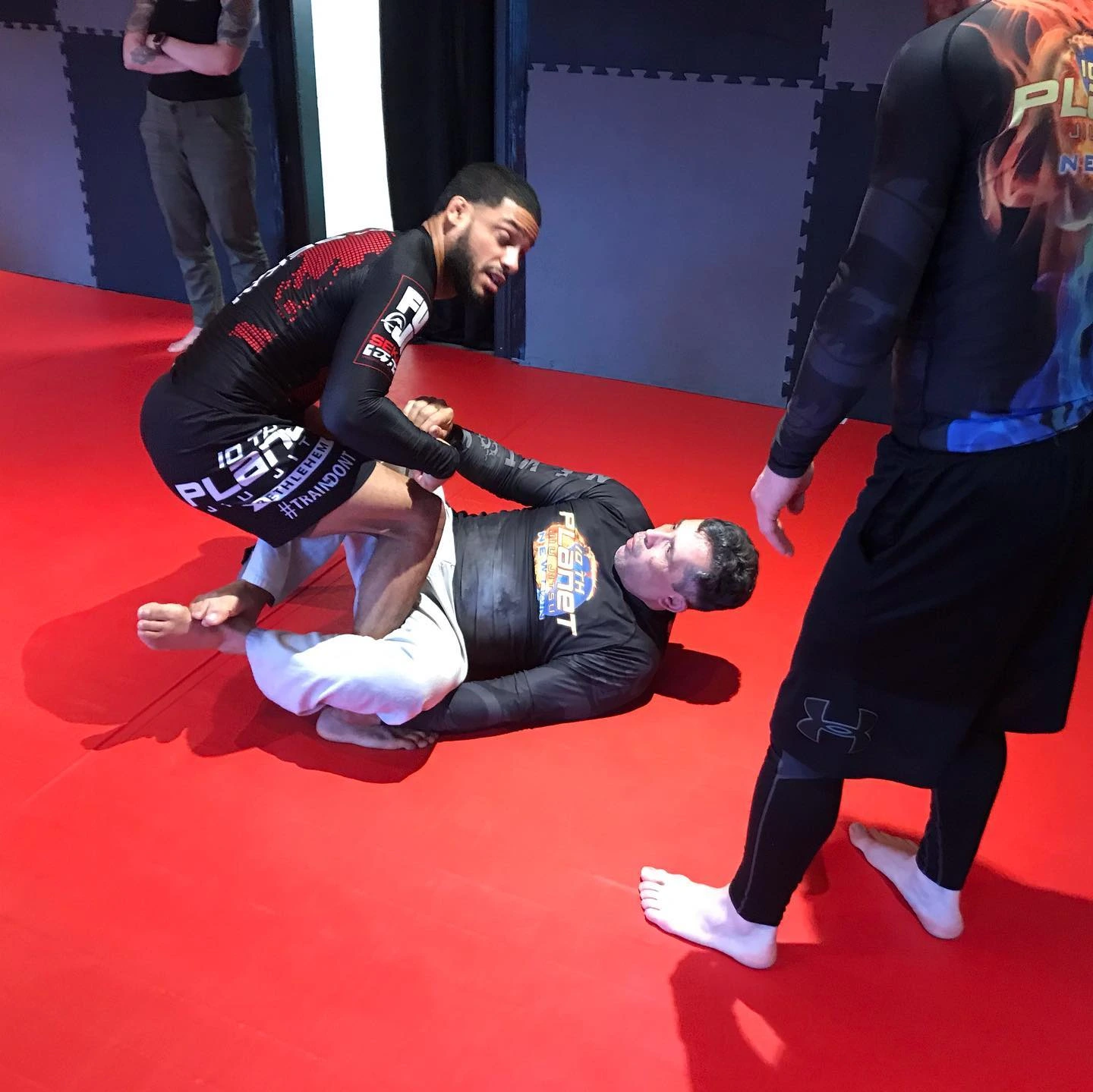 Jiu-jitsu athletes on the mat